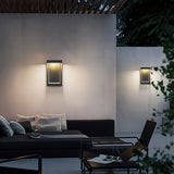 Ravon | Modernist Outdoor Wall Light in Black Metal with Ribbed Shade for Courtyard and Patio Use