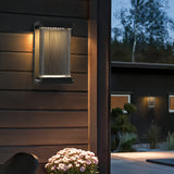 Ravon | Modernist Outdoor Wall Light in Black Metal with Ribbed Shade for Courtyard and Patio Use