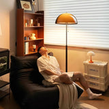 Evelisse | Retro-Inspired Floor Lamp with Amber Dome and Warm Glow