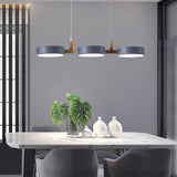Moryn | Nordic Pendant Light with Multiple Cylinder Shades in Iron and Wood for Dining Rooms