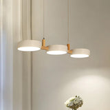 Moryn | Nordic Pendant Light with Multiple Cylinder Shades in Iron and Wood for Dining Rooms