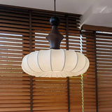 Norisse | Luxury Silk Pendant Light with Wooden Detail and Soft Ambient Lighting for Dining and Living Spaces