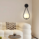Norvella | Frosted Glass Wall Light with Teardrop Shape for Warm Interior Lighting