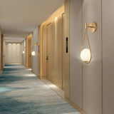 Norvella | Frosted Glass Wall Light with Teardrop Shape for Warm Interior Lighting