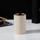 Meron | Four-Piece Ceramic Bathroom Accessory Set with Gold Trim in Matte Black and White for Sink