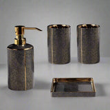 Meron | Four-Piece Ceramic Bathroom Accessory Set with Gold Trim in Matte Black and White for Sink