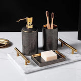 Meron | Four-Piece Ceramic Bathroom Accessory Set with Gold Trim in Matte Black and White for Sink
