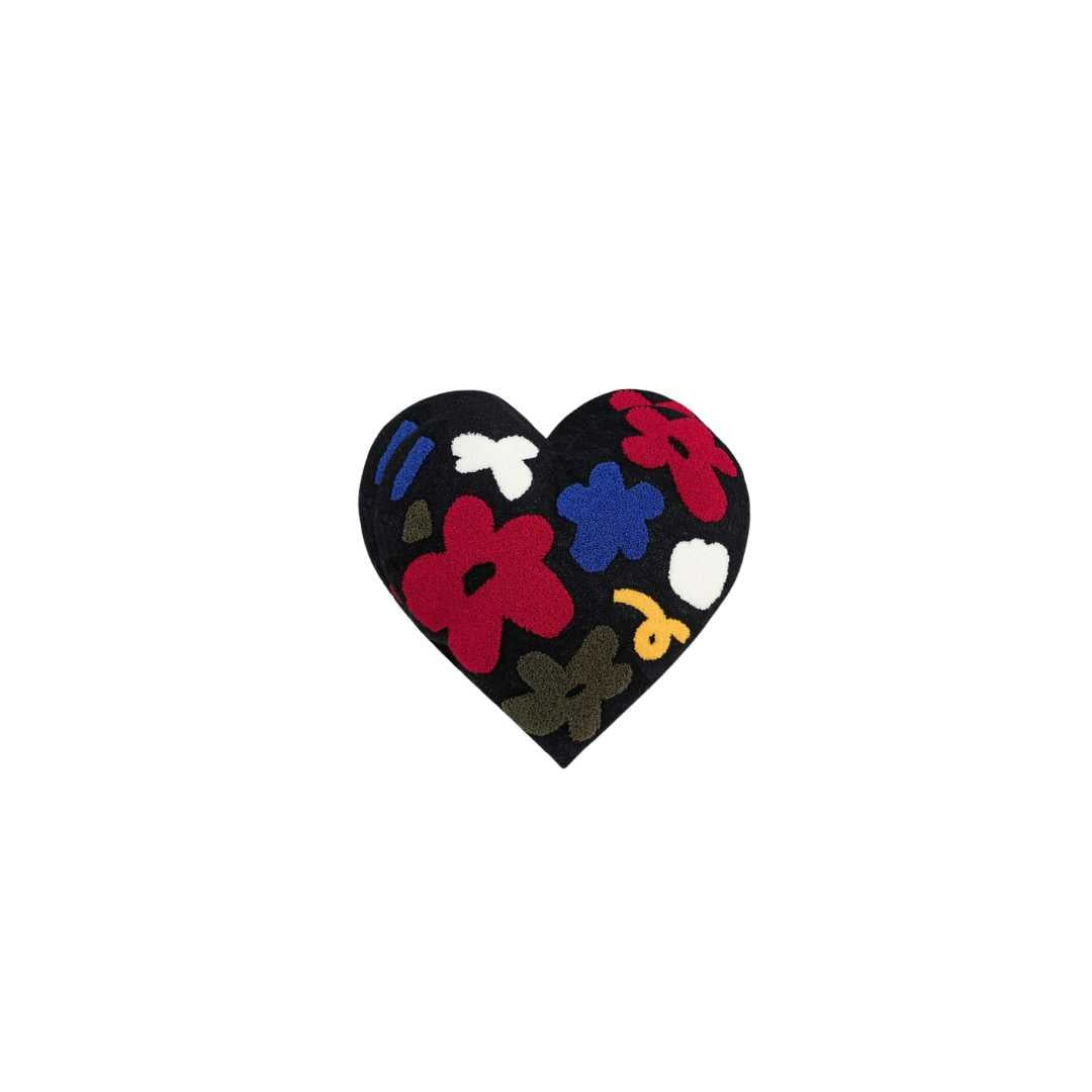 Latimer heart shaped embroidered cushion with colourful floral tufting on black fabric