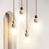 Minimalist Spherical Pendant Light with Natural Accents 1