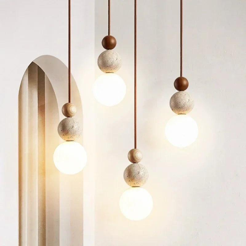 Minimalist Spherical Pendant Light with Natural Accents 1