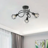 Penhurst industrial black iron ceiling light with three wire cage shades mounted on a white ceiling