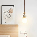 Minimalist Spherical Pendant Light with Natural Accents 3