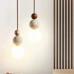 Minimalist Spherical Pendant Light with Natural Accents 4