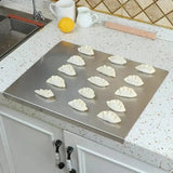 Nomi | Stainless Steel Chopping Board with Non-Slip Silicone Pads and Spill Edge, Two Sizes