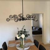 Lumorae | 15 Light Linear Sputnik Chandelier in Black & Brass with Glass Globes
