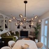 Lumorae | 15 Light Linear Sputnik Chandelier in Black & Brass with Glass Globes
