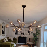 Lumorae | 15 Light Linear Sputnik Chandelier in Black & Brass with Glass Globes